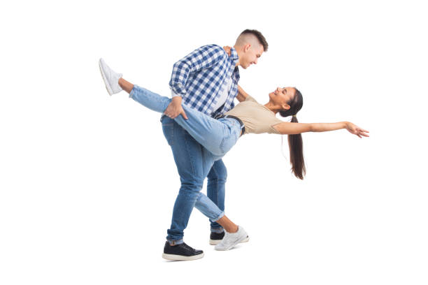 istock Young man and woman dancing tango 1353446808