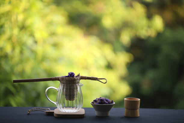 istock forget me not flower tea with old style teapot 1353447124