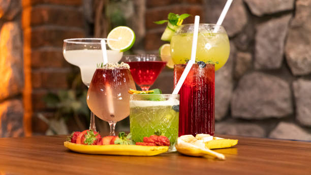 istock Colorful cocktails on bar counter 1353448009