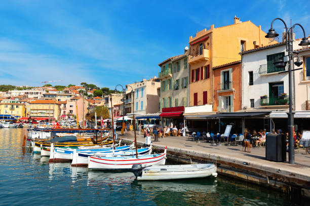 istock Yachts and boats along shore in Cassis 1353448788