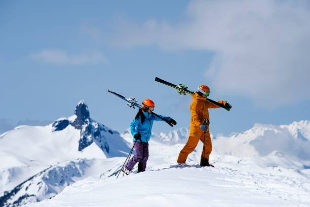 istock Couple skiing in Whistler, Canada 1353450057
