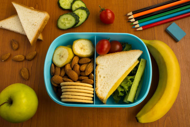 istock School lunch  and ingredient in the box  on the table. Top view. Close-up. 1353453799
