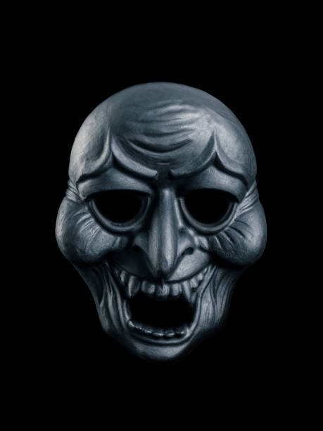 istock Creepy mask isolated on black with clipping path 1353453967