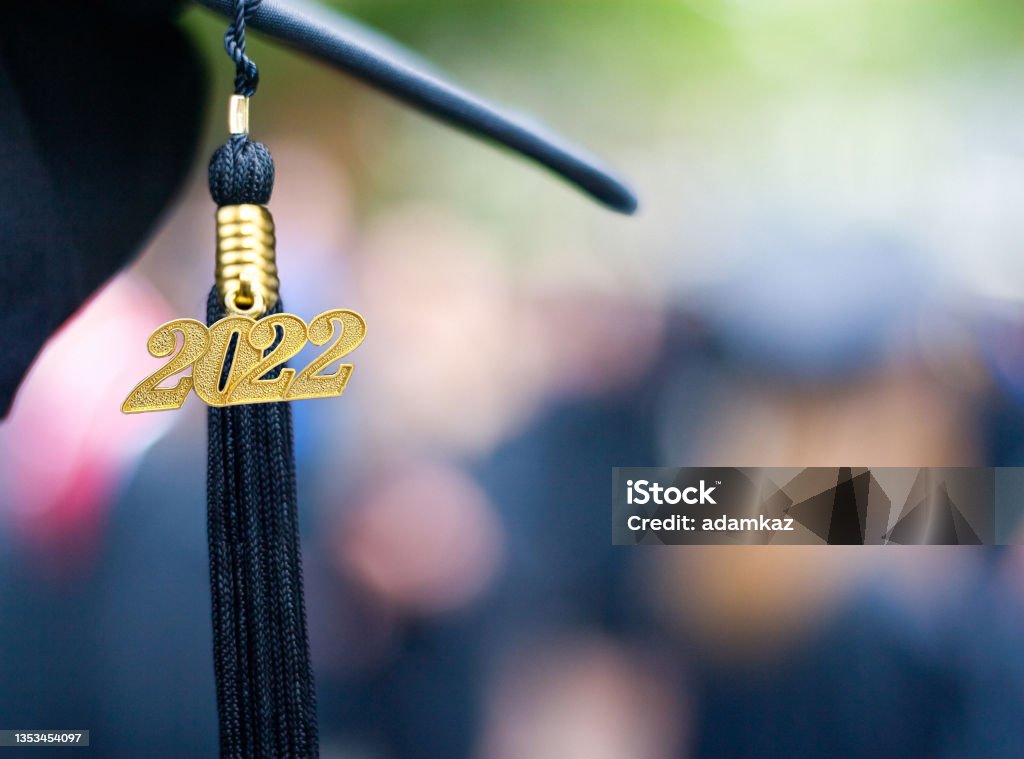 Class of 2022 Graduation Ceremony Tassel Black Closeup of a 2022 Graduation Tassel at a graduation ceremony. Graduation Stock Photo
