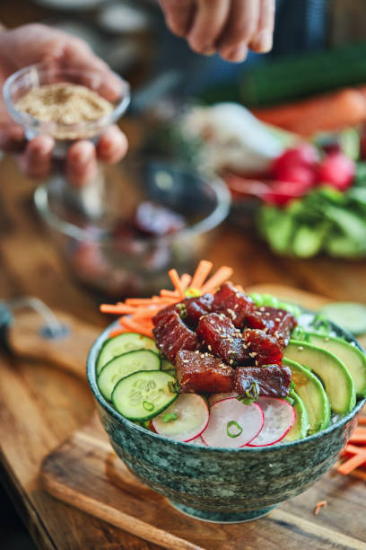istock Ahi Tuna with Cucumber, Radish, Carrots and Avocado 1353455120