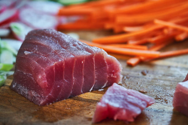 Preparing Ahi Tuna with Cucumber, Radish, Carrots and Avocado