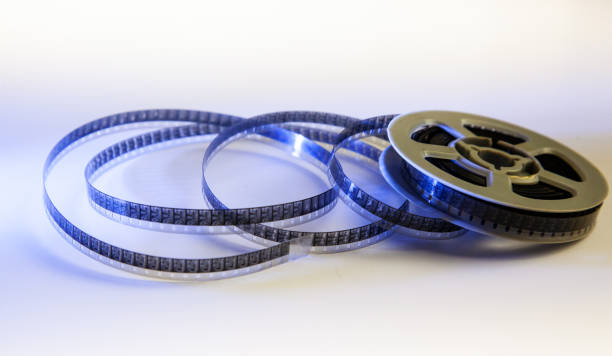 istock Roll of old film on white background 1353457069