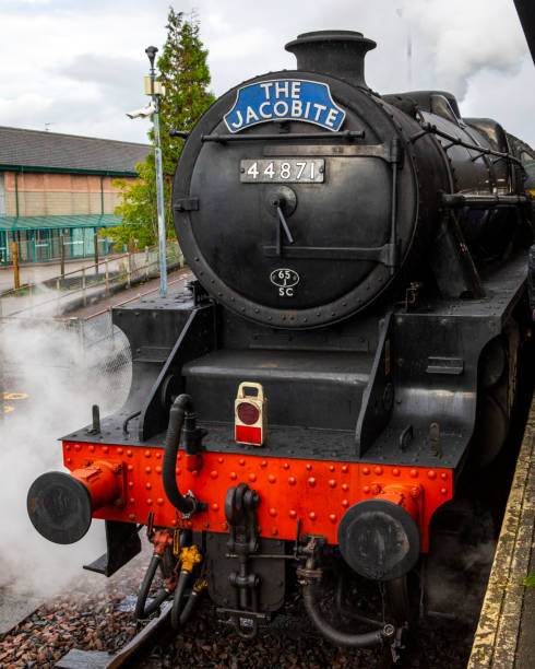 Fort William, Scotland - October 9th 2021: A Jacobite steam train that journeys from Fort William, crossing over the Glenfinnan Viaduct to Mallaig, in the Highlands of Scotland.