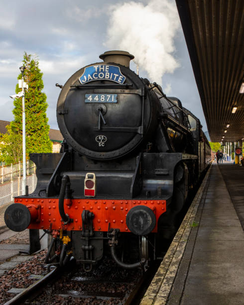 Fort William, Scotland - October 9th 2021: A Jacobite steam train that journeys from Fort William, crossing over the Glenfinnan Viaduct to Mallaig, in the Highlands of Scotland.