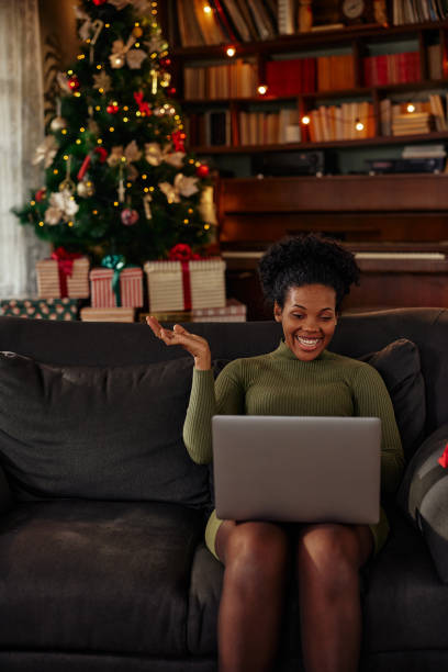 istock Christmastime at home with joys of technology 1353460883