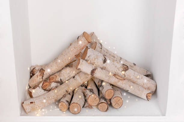 istock White fireplace decorated with a New Year's decor 1353460918