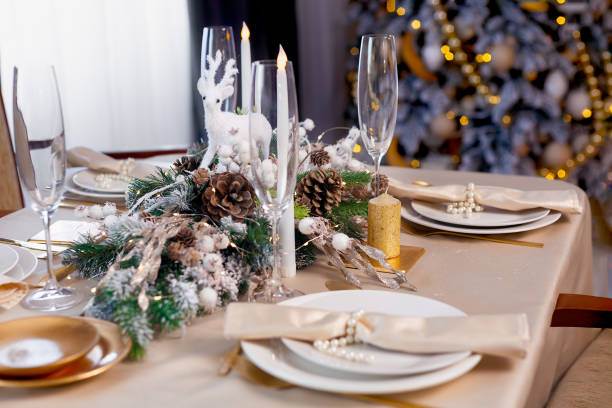 istock Candle, decorated with cinnamon sticks on Christmas table 1353460942