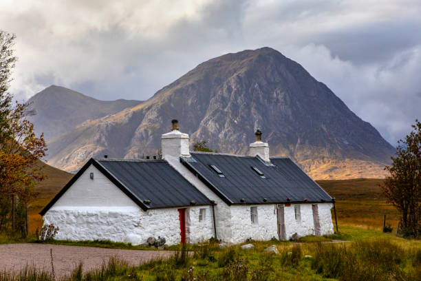 Blackrock Cottage with Buachaille Etive Mor in the background, in Glencoe, Scotland Glencoe, Scotland - October 10th 2021: The view of Blackrock Cottage with Buachaille Etive Mor in the background, in the Glen Etive area of Glencoe in the Scottish Highlands. etive river photos stock pictures, royalty-free photos & images