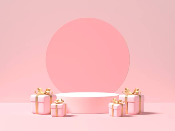 istock Pink podium and gift boxes on pink background. 3d rendering 1353463975