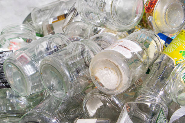 istock Glass jars collected for recycling. Environmental protection. 1353465555