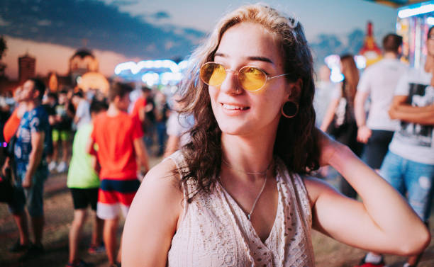 istock Lesbians hug at the fair 1353471050