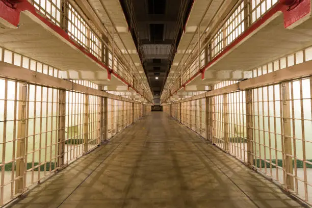 Photo of Brodway, the main corridor of the cellhouse dividing B and C Blocks of Alcatraz Prison at Alcatraz Island.