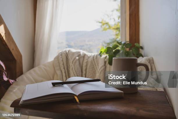 Cozy Window Nook With Open Journal And Coffee Stock Photo - Download Image Now - Tranquility, Nook - Architecture, Reading