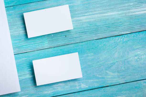 istock Business cards blank. Mockup on color background. Flat Lay. copy space for text 1353478038