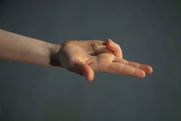 istock Child's hand shows gesture. Child's fingers. 1353482240
