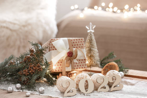 istock Christmas composition with numbers 2022 on blurred background with bokeh. 1353482567