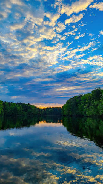 istock Early sunrise on cloudy day 1353484078