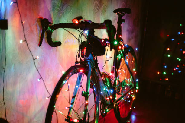 Bicycle decorated with Christmas lights stock photo