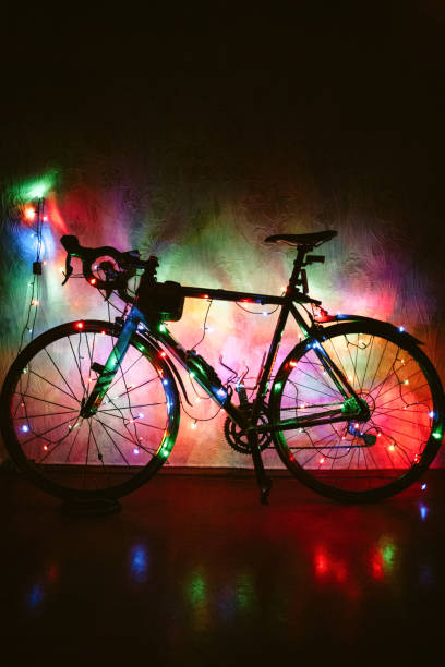 istock Bicycle decorated with Christmas lights 1353484123