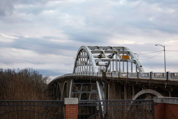 Edmund Pettus Bridge in Selma, AL Selma, Alabama, USA - Jan. 26, 2021: Historic Edmund Pettus Bridge spanning the Alabama River in Selma, AL. Named after a Confederate General, it is where the Bloody Sunday conflict occurred on March 7, 1965 in the civil rights movement. civil rights photos stock pictures, royalty-free photos & images