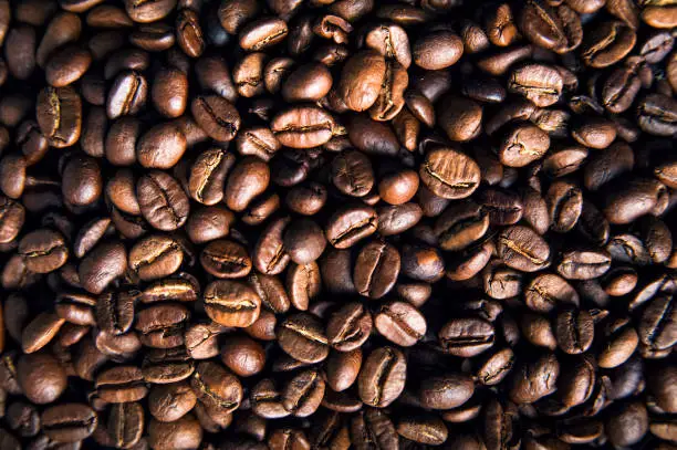 Photo of Close-up coffee beans background texture..