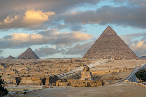 Sphinx and pyramids in the Giza necropolis.