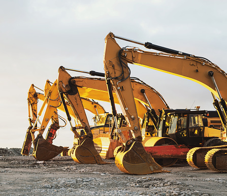 Heavy equipment on a large construction site.