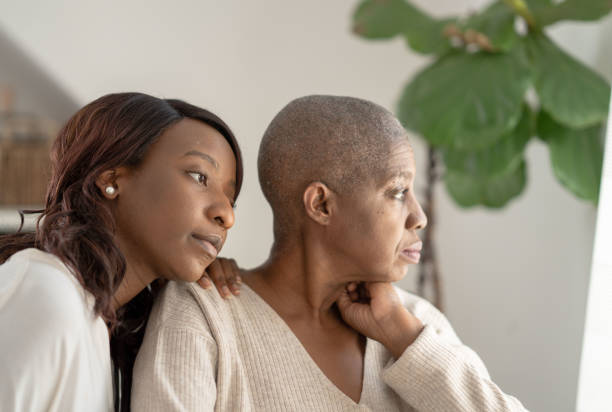 istock Sitting With Mom by the Window 1353496471
