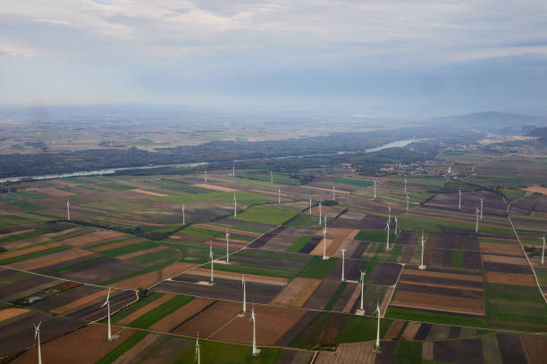 istock wind turbine, wind turbine seen from an airplane. climate change concept, 1353498169