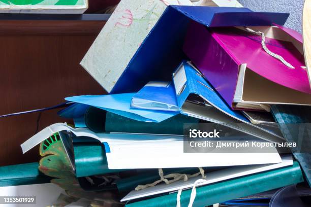 Folders Binder With Documents In A Mess Lie On The Shelf Stock Photo - Download Image Now