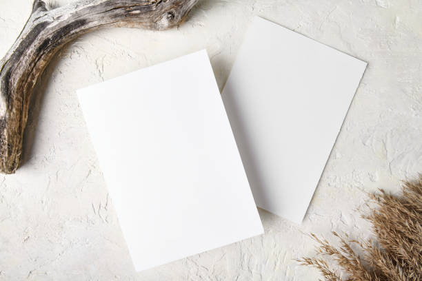 istock Two white invitation card mockup with pampas grass decoration 5x7 1353502094