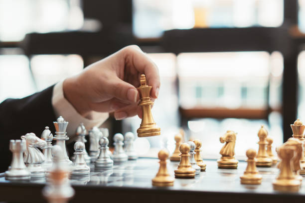 istock chess board game competition business concept 1353502890
