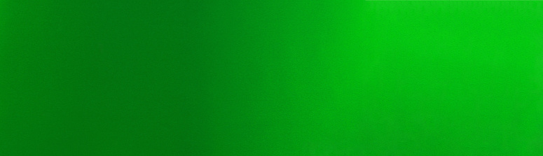 Elegant gradient vibrant shamrock green metallic shiny background web banner. St Patricks celebrating backdrop