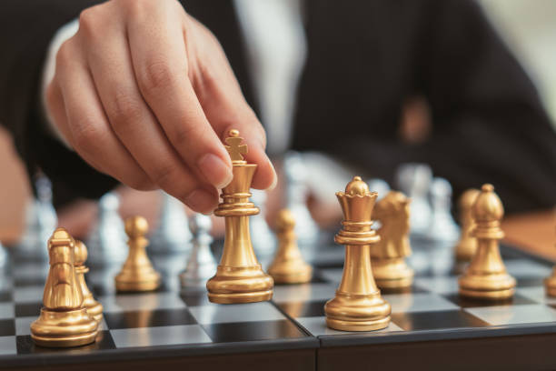 istock chess board game for ideas and competition and strategy, business success concept 1353505575