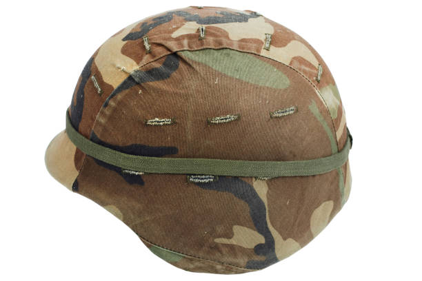 istock us army kevlar helmet with camouflaged cover 1353506596