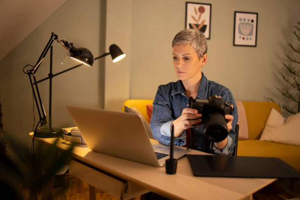 istock Professional photographer working from home 1353511376