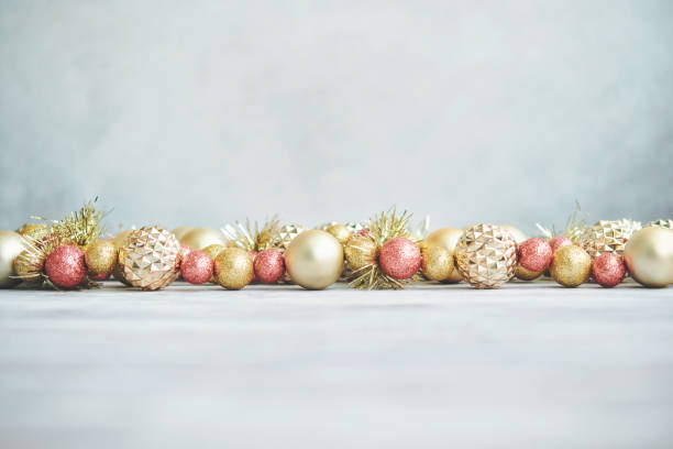 istock Modern Lux Christmas Backgrounds with Metallic Christmas Decorations on White Wood 1353527619