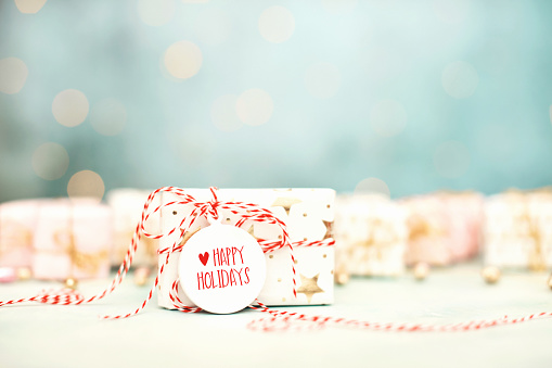 Bright Christmas Background with Happy Holidays Message on Christmas Gift