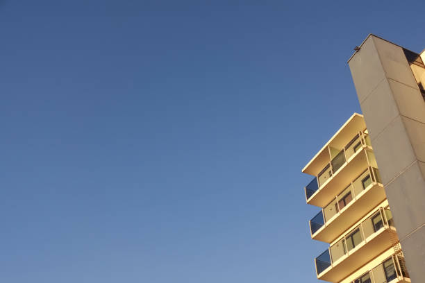 istock White modern apartments building facade in sunlight on a sunny day with clear blue sky. Vana - Kuuli street. Tallinn, Estonia, Europe. Nov 2021 1353532944