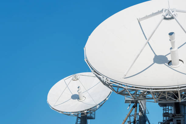 istock Satellite Communication Dish on top of TV Station 1353535192