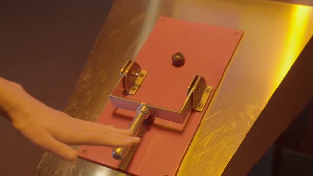 hand pulls on mechanical switch lever