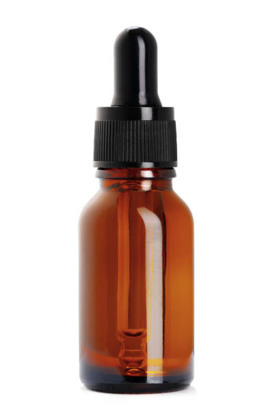 istock Brown plastic, glass bottle for cosmetics isolated on white 1353541440