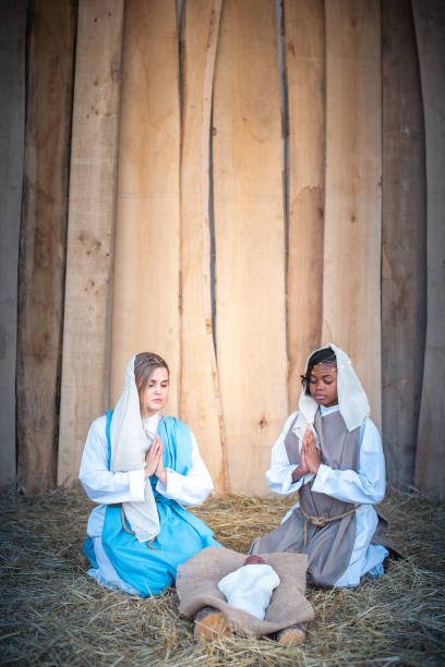 istock lgtb nativity scene with two virgin marys 1353542806