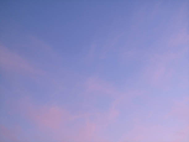 istock Milky purple pink sunset. Evening sky with clouds. Abstract background 1353543910