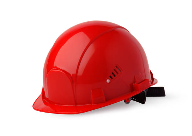 Red plastic safety hardhat isolated on white background, close up